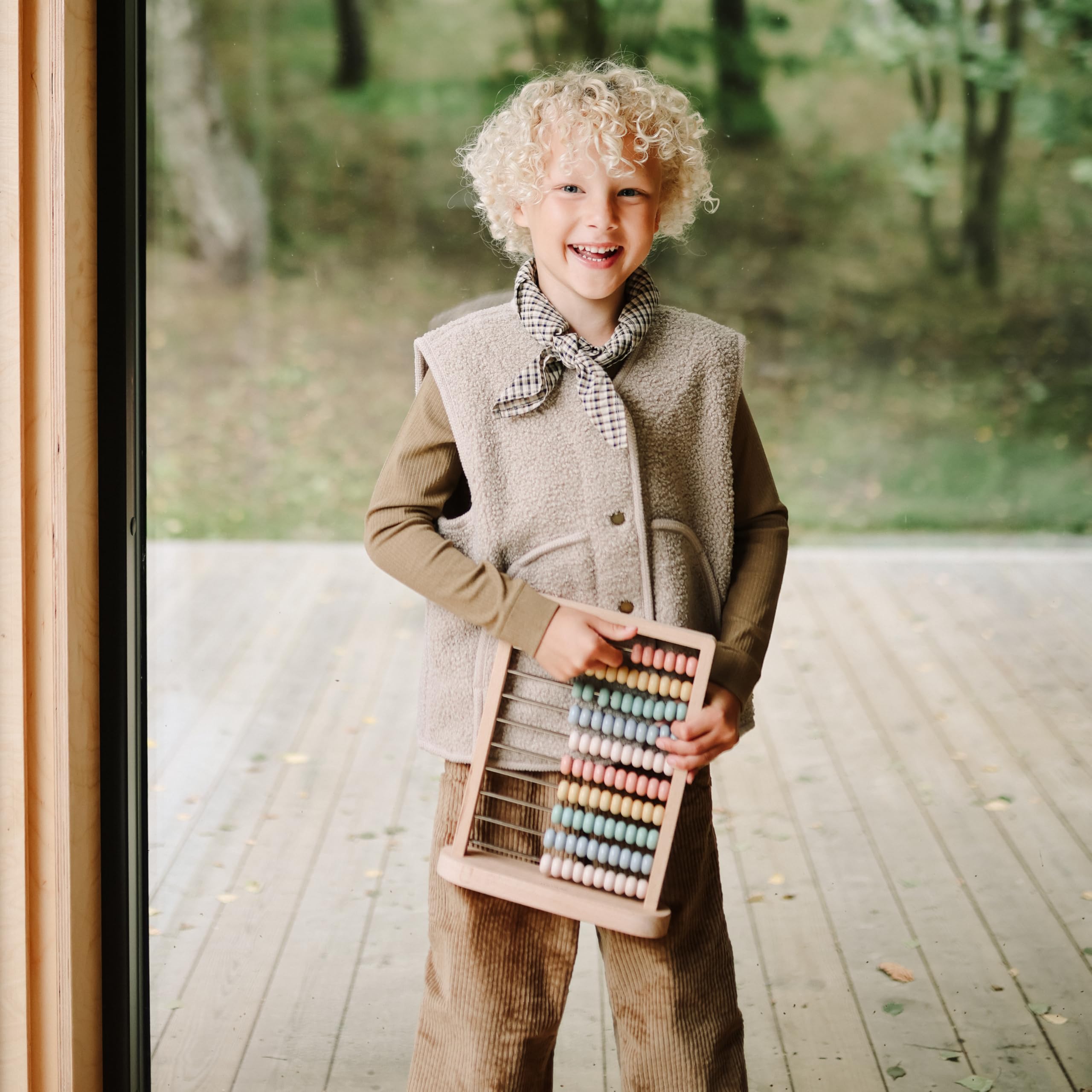 Mushie abacus is ideal for toddlers 2+ exploring numbers and patterns.