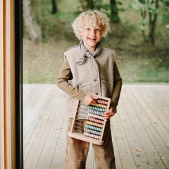 Mushie abacus is ideal for toddlers 2+ exploring numbers and patterns.