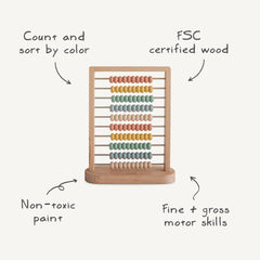 Mushie abacus wooden rails form a sturdy frame for hands-on learning.