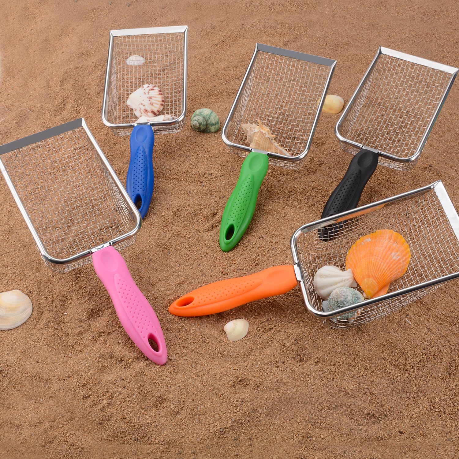 MUYIZI kids using scoop on wet sand enjoying easy filtration and shell discovery.