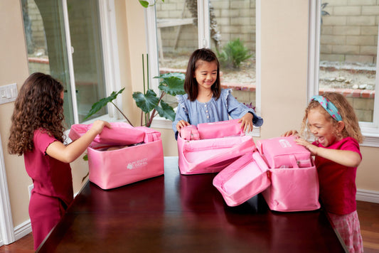 MY BEAUTYSHOP PAL Carry-All Bag keeps accessories organized during play.