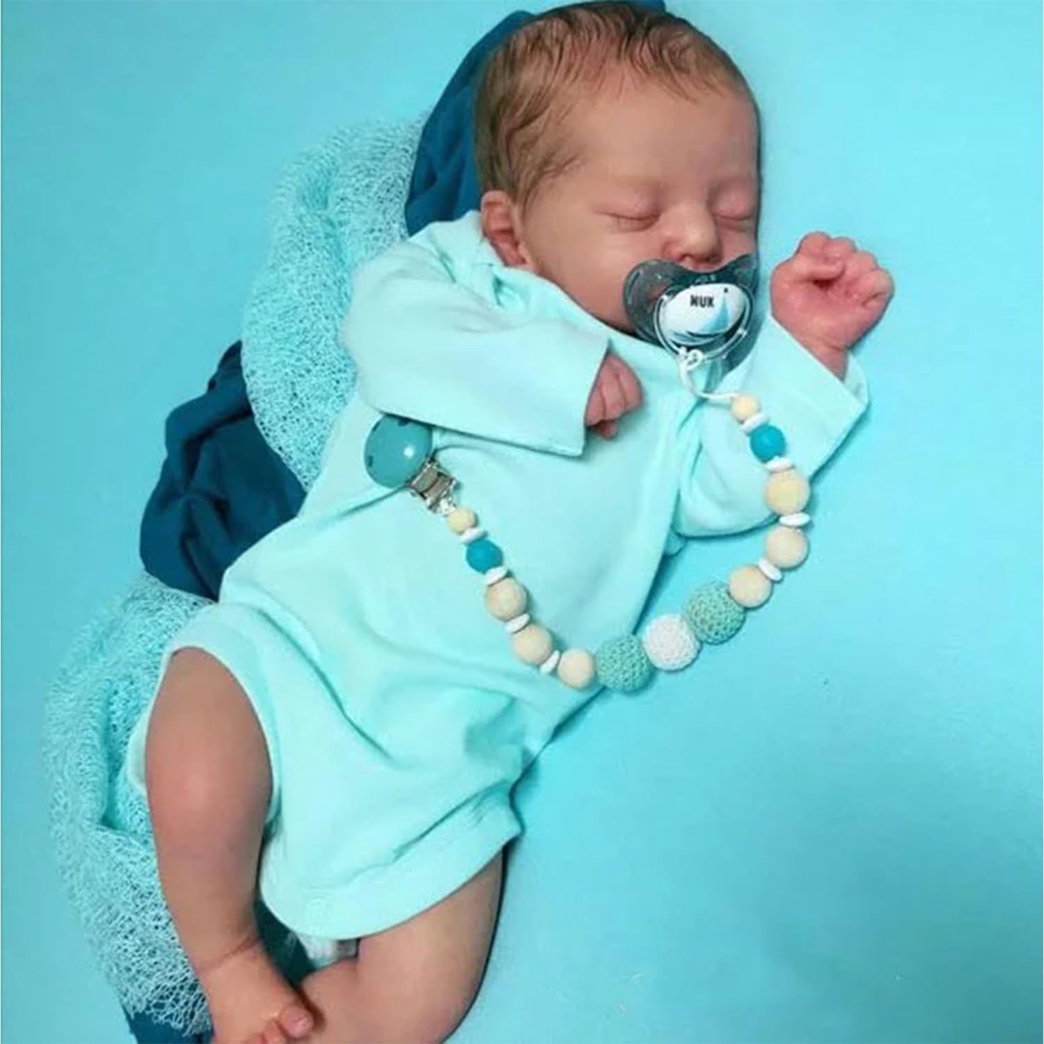 MYREBABY Soren sleeping baby boy doll with soft cloth body for comforting cuddle and pretend play.