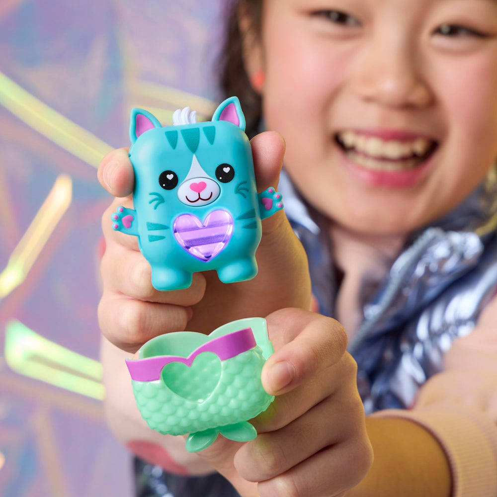 Nano-MALS Pawtricia attached keychain for backpack on-the-go fun.