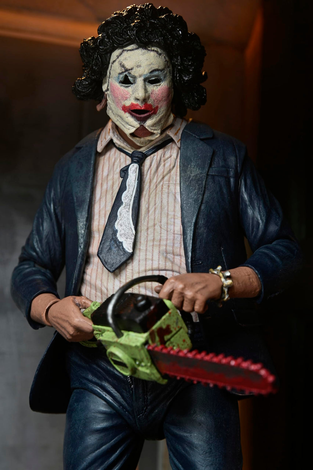 NECA Leatherface knife accessory for additional styling options.