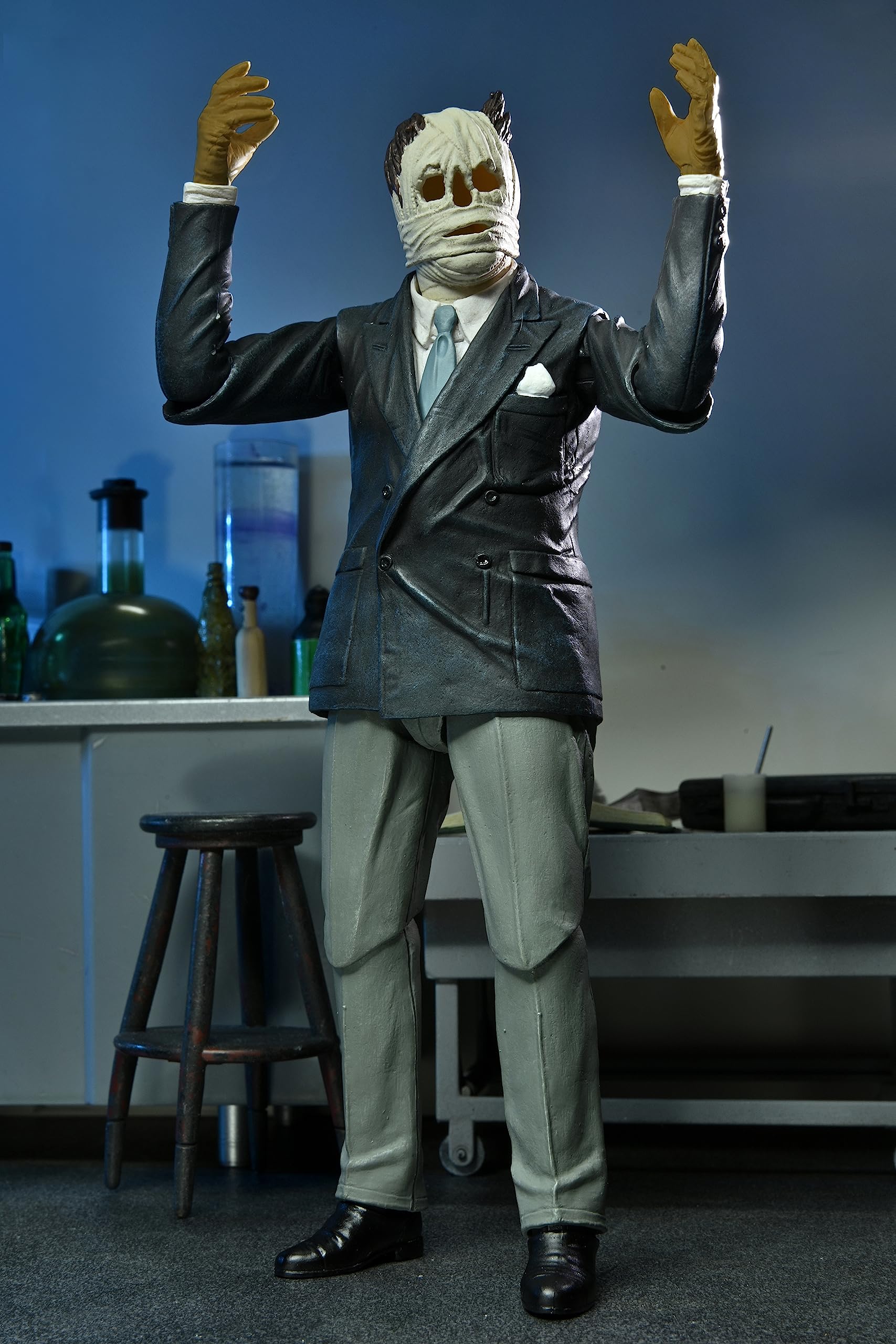 NECA Invisible Man cup with straw supports interactive display scenes.