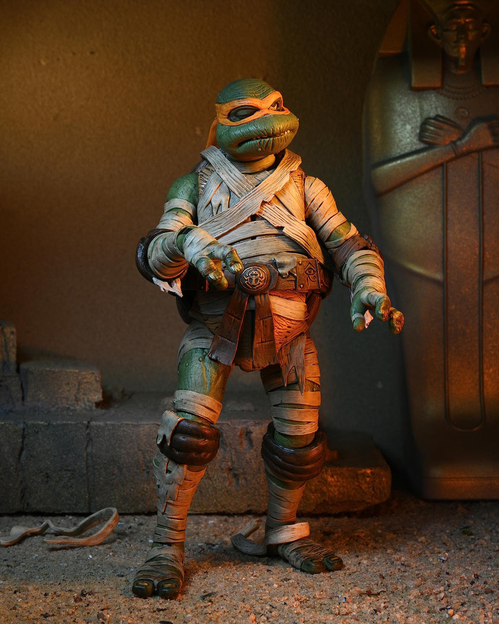 NECA Michelangelo as The Mummy interchangeable heads and hands for posing.