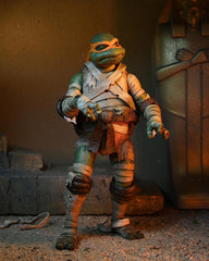 NECA Michelangelo as The Mummy interchangeable heads and hands for posing.