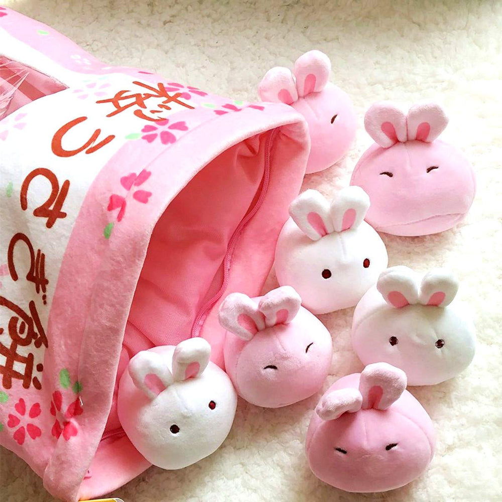 Nenalayo eight mini bunnies inside pillow offers playful decor options.