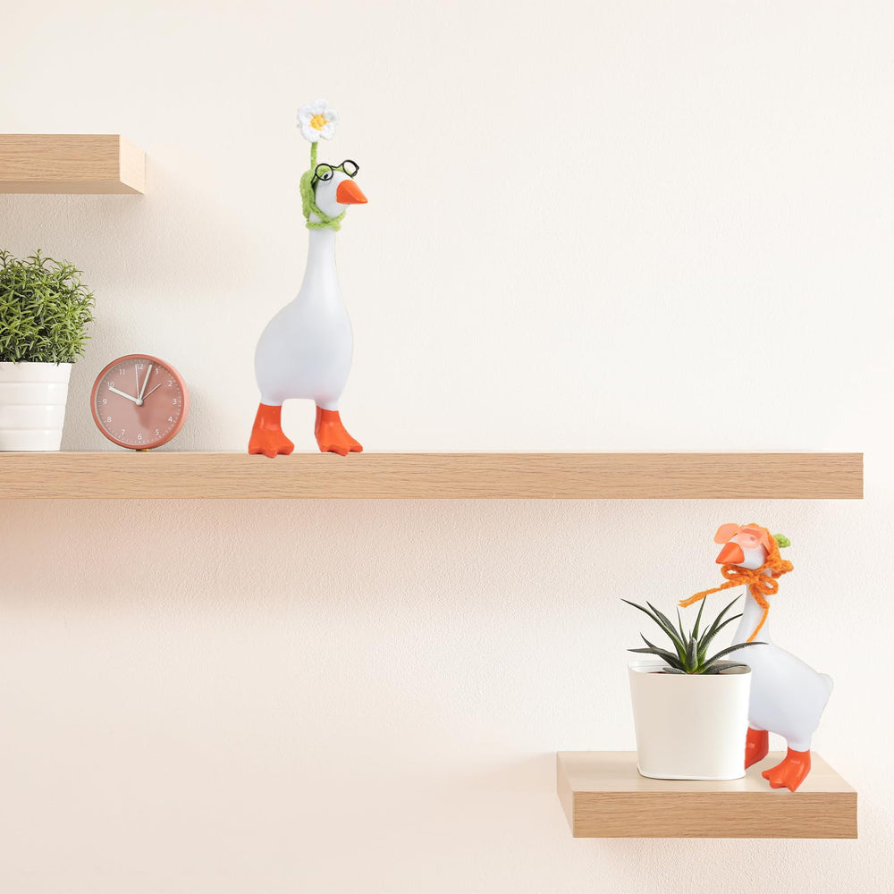 Neowedding desk goose wearing carrot hat brings playful harvest vibes