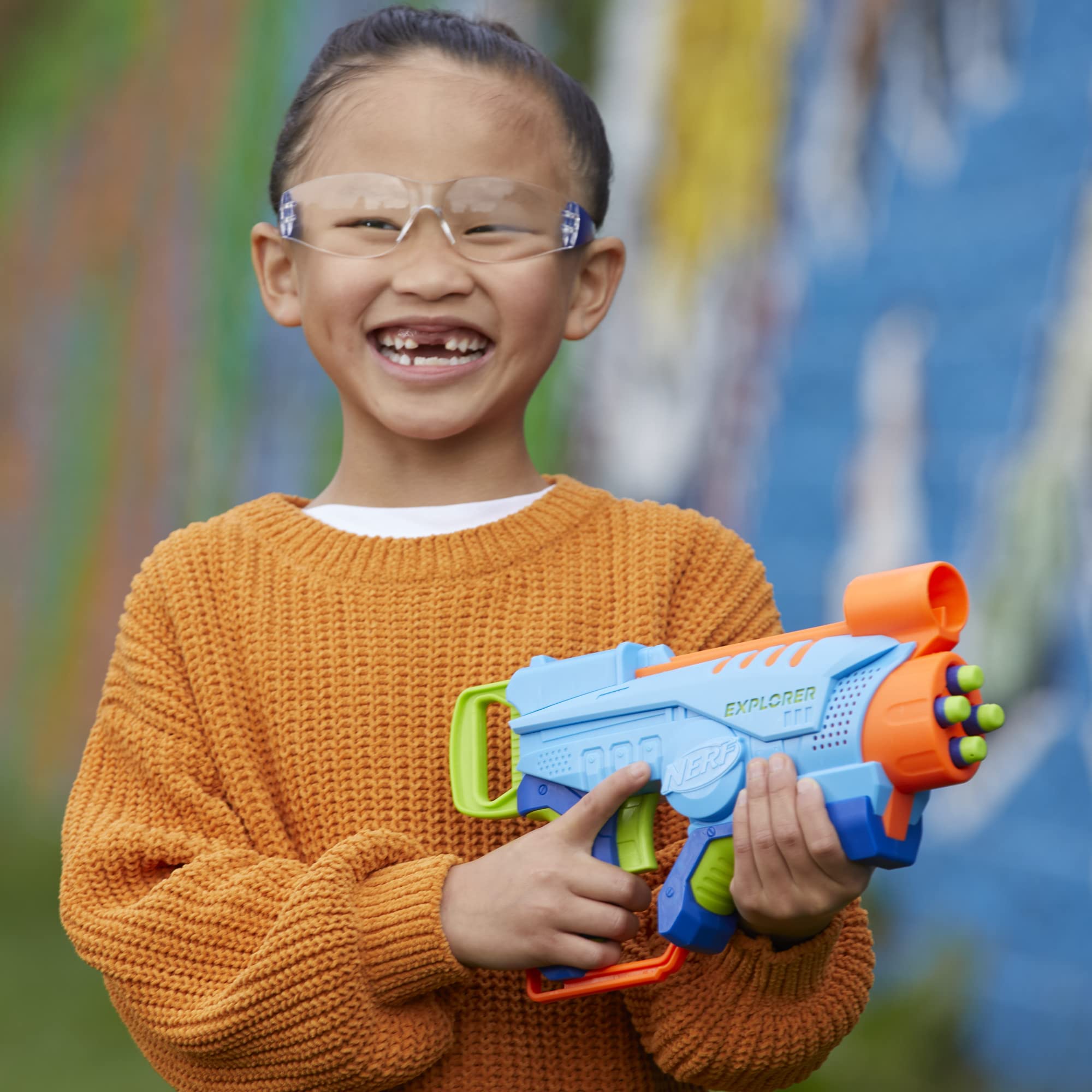 NERF Elite Junior Explorer dart-dispensing action during a friendly skirmish.