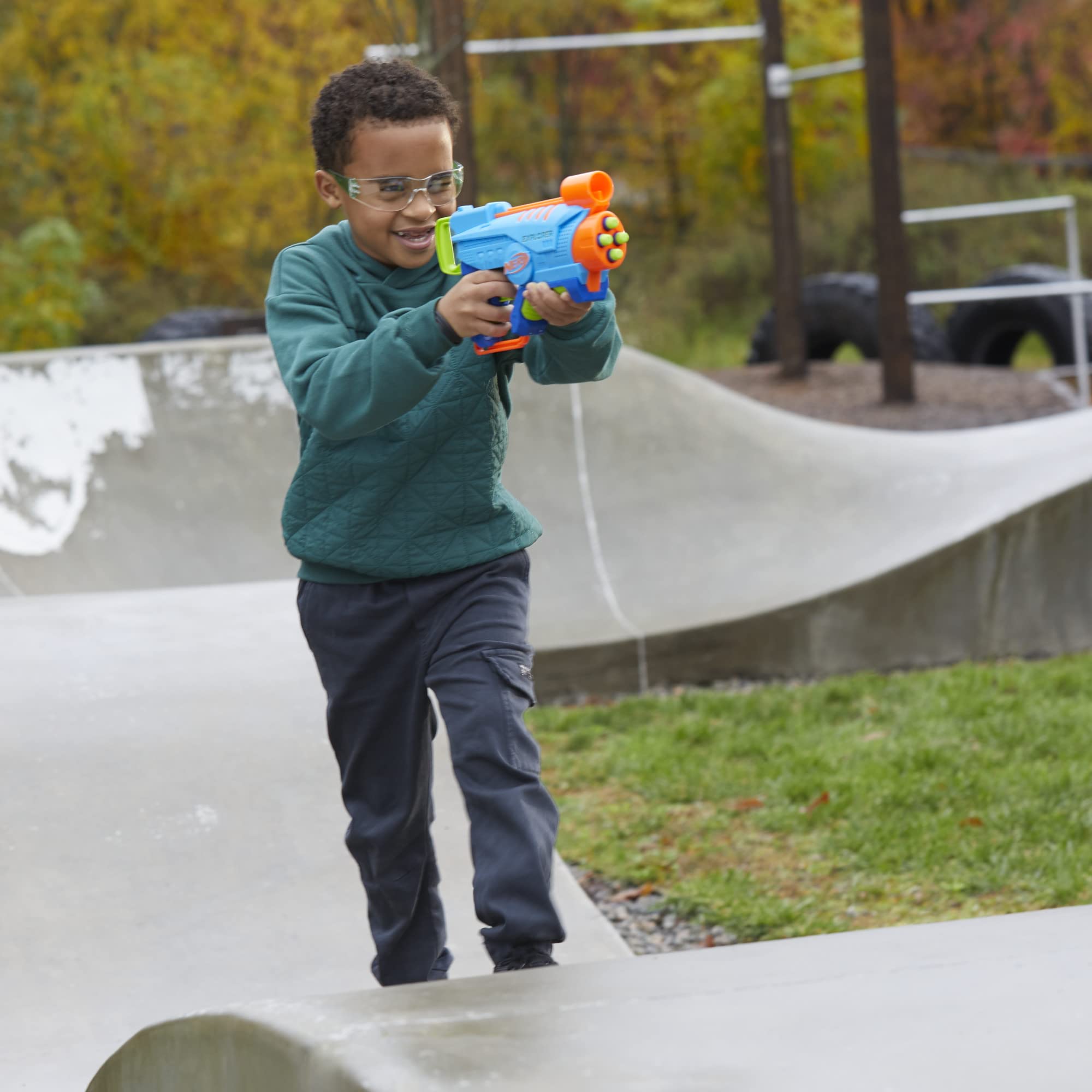 NERF Elite Junior Explorer kid-in-action captures energetic outdoor fun.