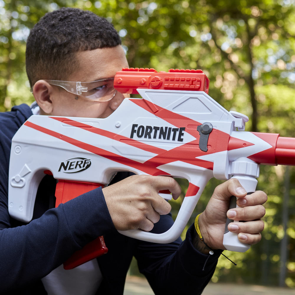 Battery compartment of Nerf Fortnite B-AR holds four C cells for motorized power
