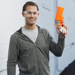 Nerf Fortnite Flare blaster held in action during indoor play
