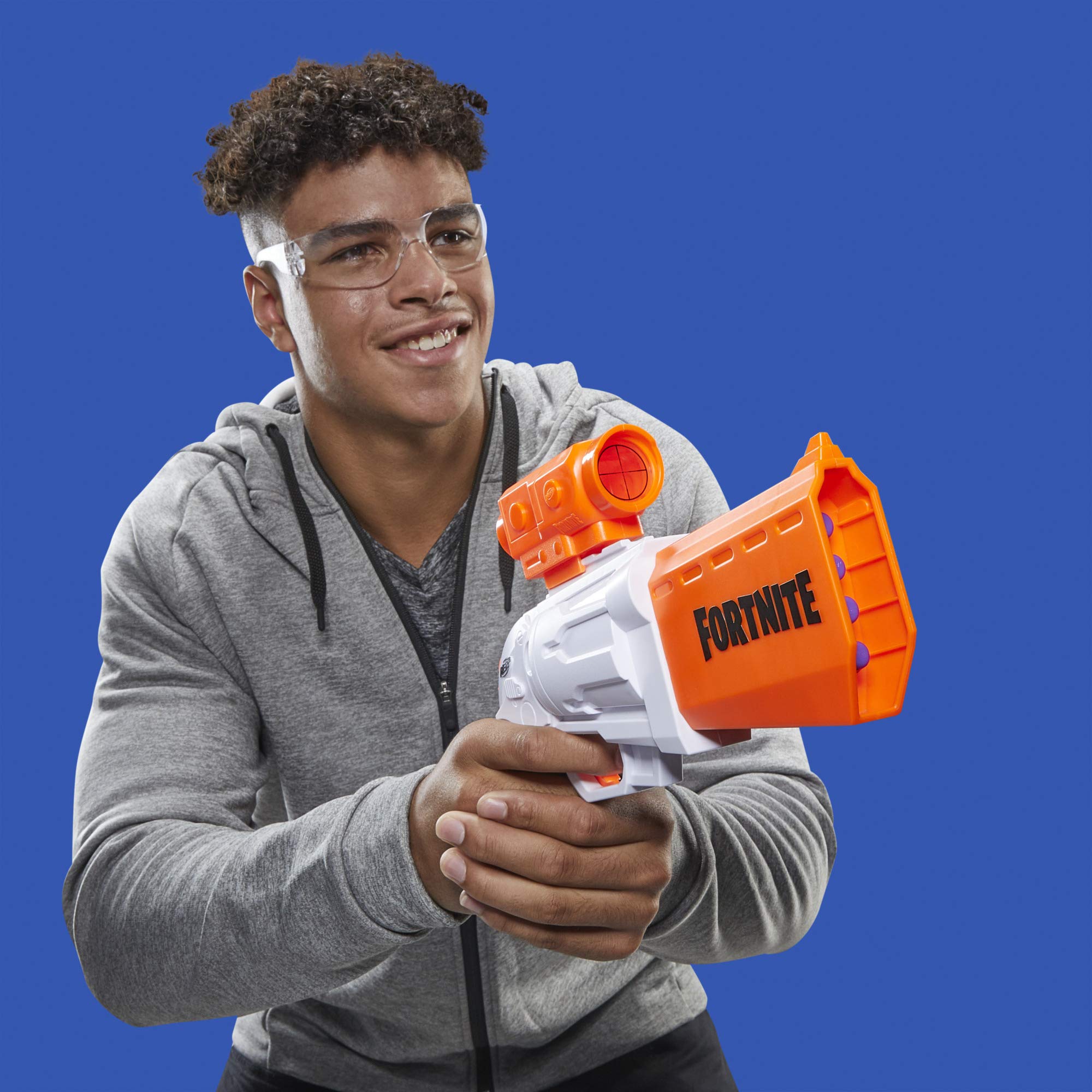 Close-up of quick reload action on Nerf Fortnite SR blaster.