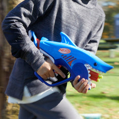 Nerf Junior Wild Sharkfire outdoor play in a sunny backyard.