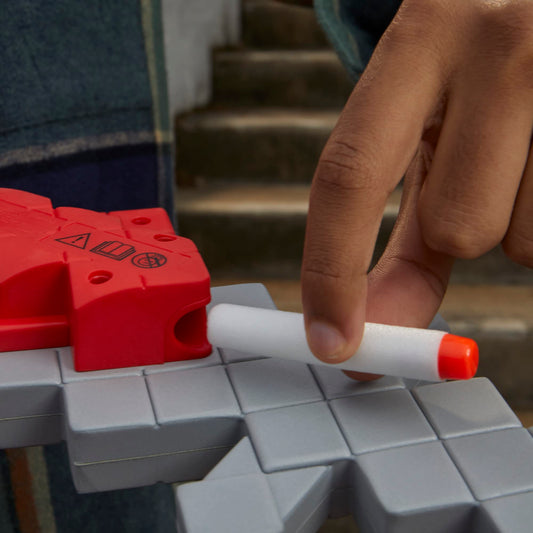 Nerf Minecraft Heartstealer Sword in action blasting a dart outdoors
