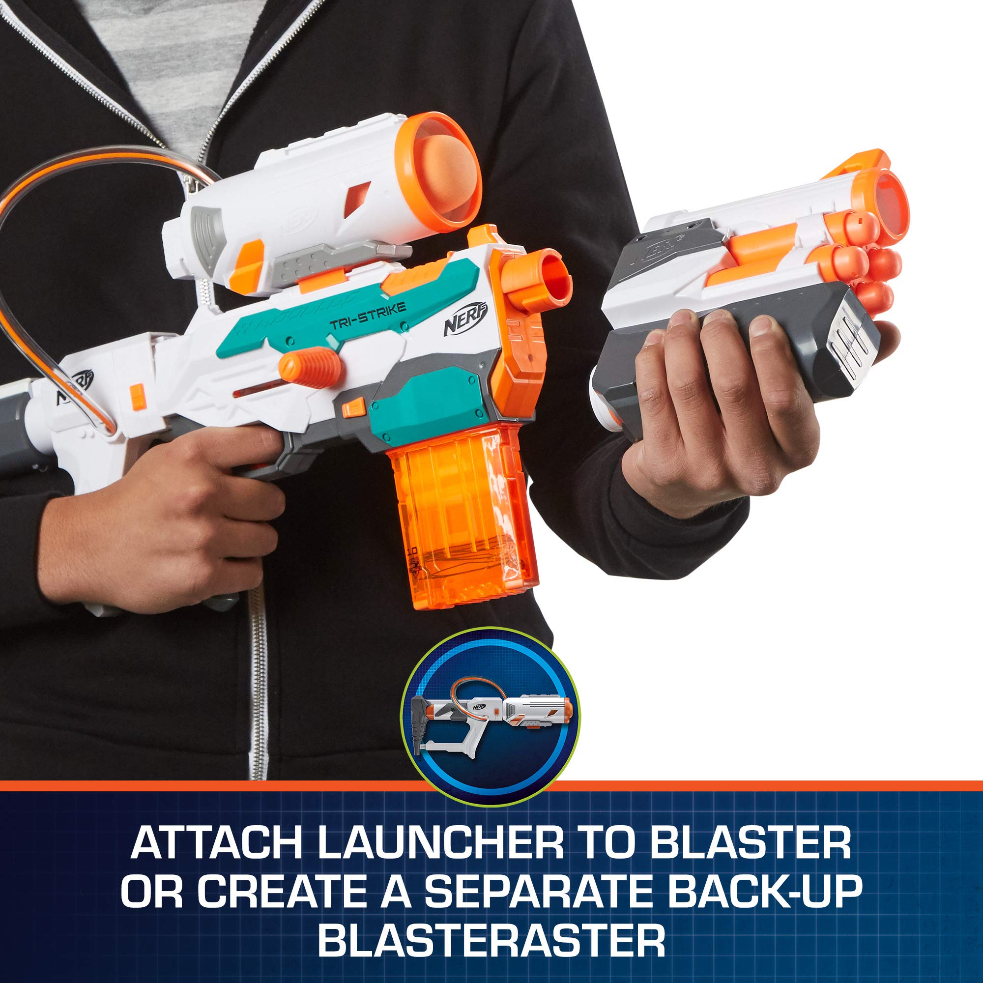 Nerf Modulus Tri-Strike elite-darts in-flight during action play.