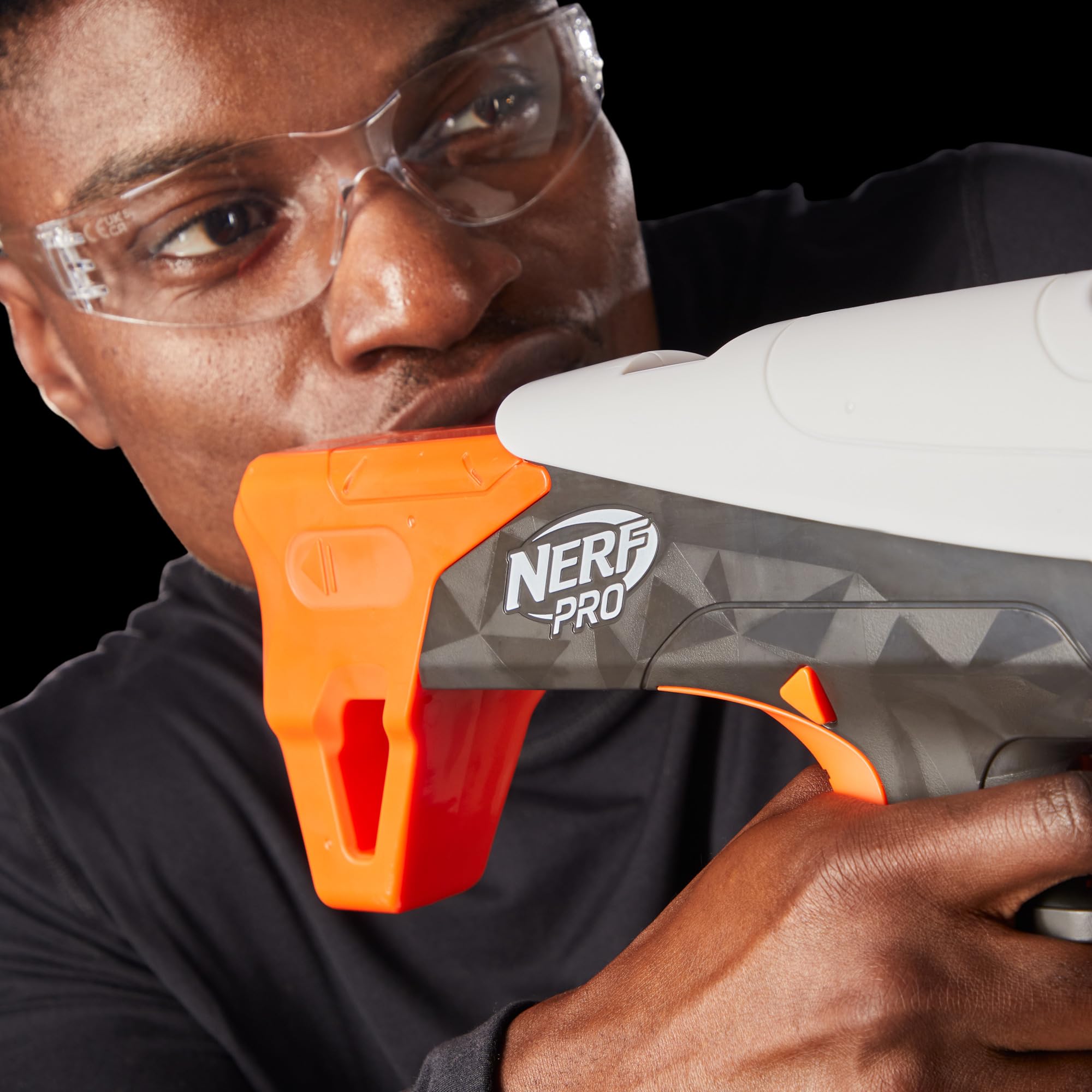 Darts and magazine compatibility with Nerf Pro blasters emphasized in use.