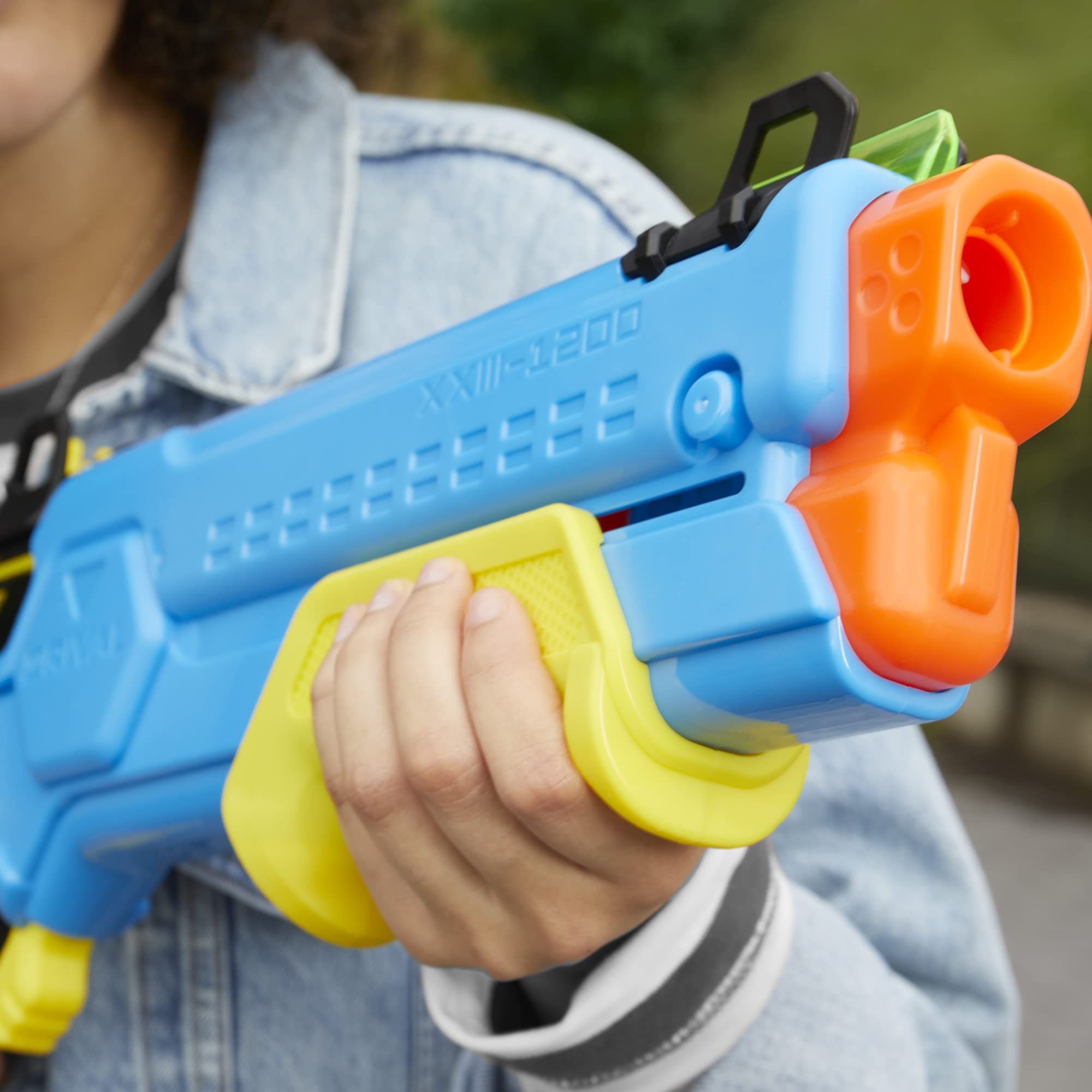 Pump-action priming shown for reliable, repeated firing.