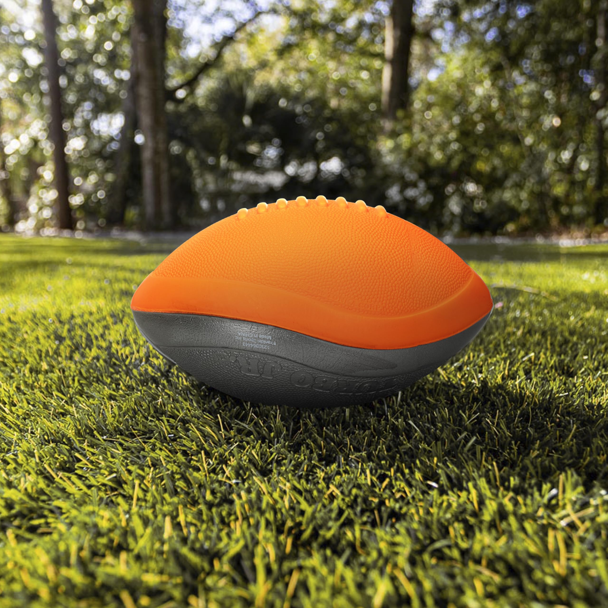 NERF Turbo Jr. foam football on the beach, perfect for carefree tosses