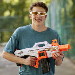 Nerf Ultra Select in backyard battle setup for family fun.
