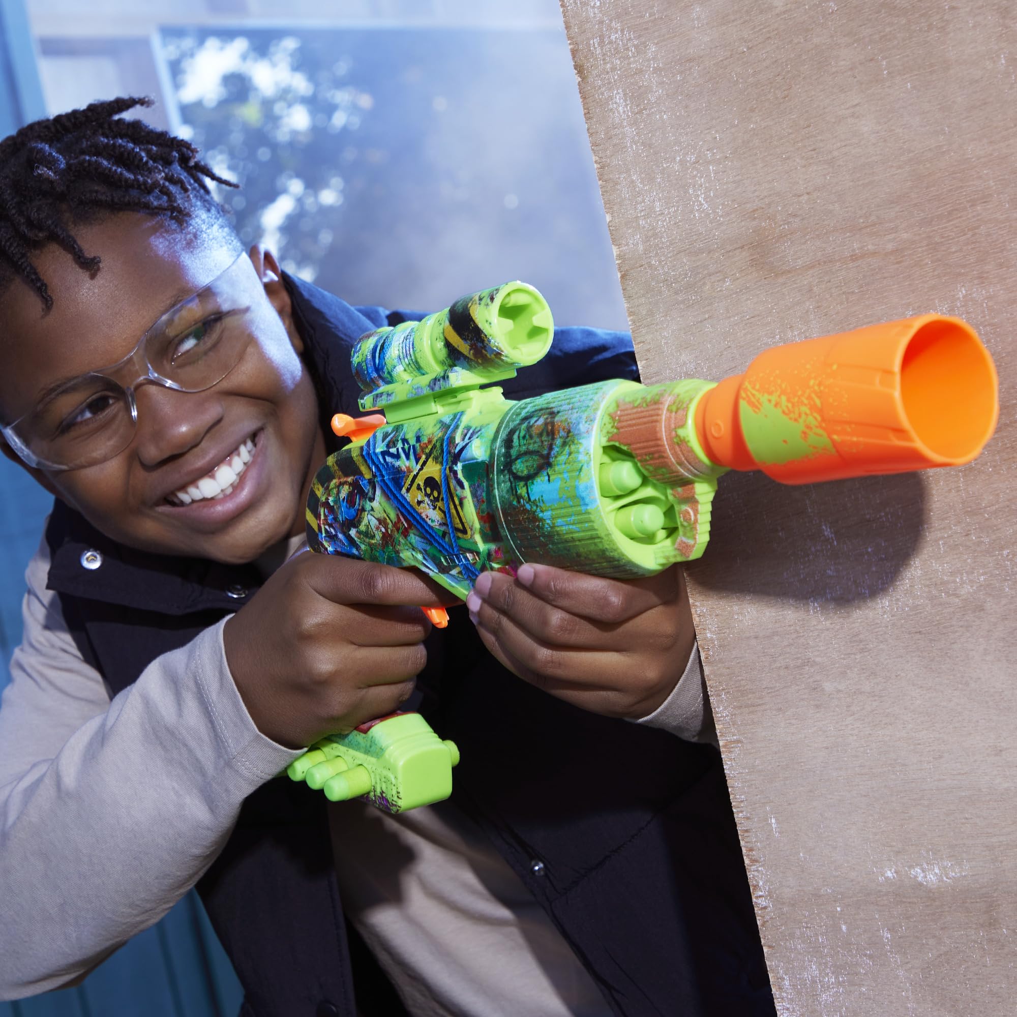 Nerf Zombie Driller darts in flight capture action moments.