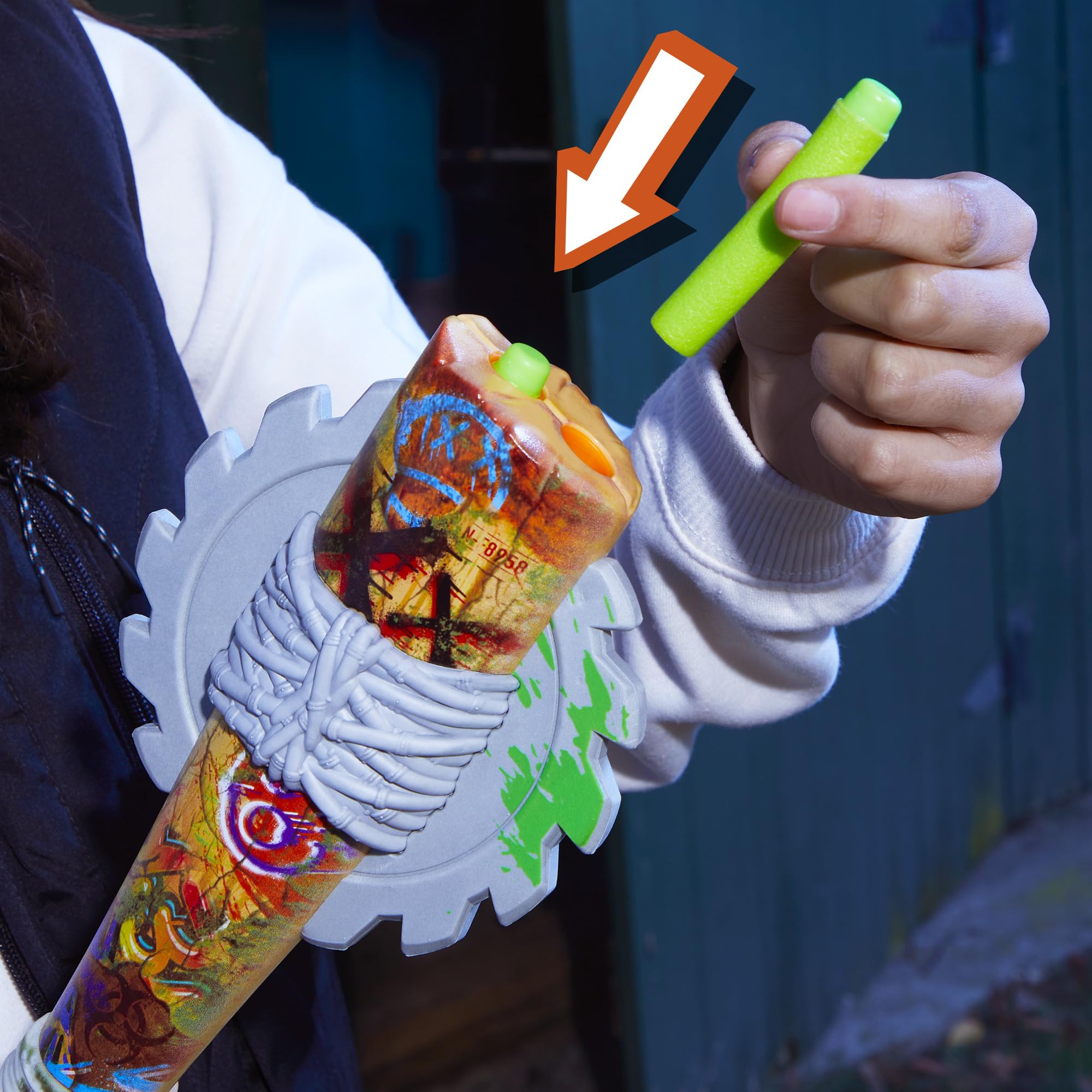 Nerf Zombie Strikeout retracting handle shown during firing for smooth operation.