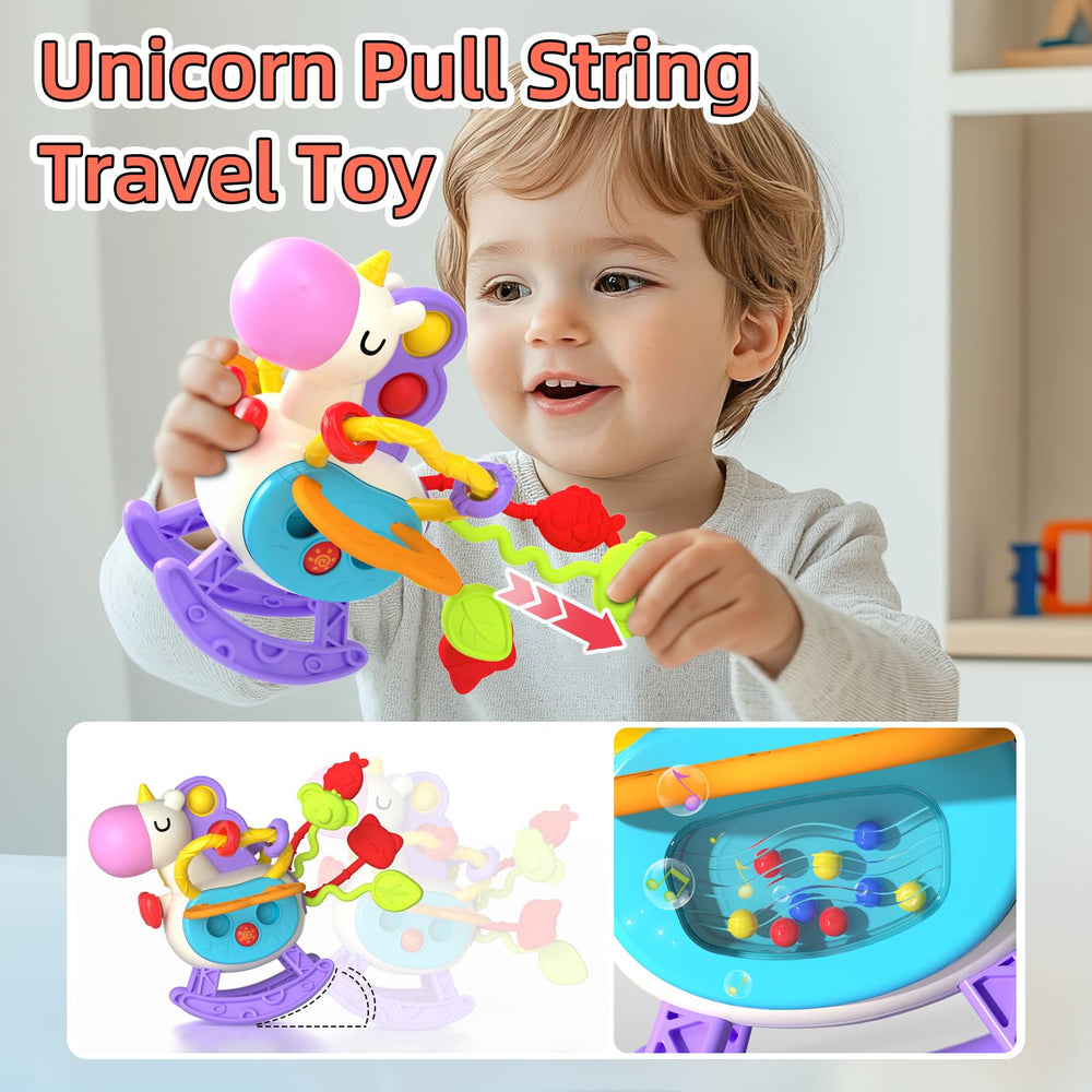 Newcrave pull-string infant toy encouraging grasping and motor practice