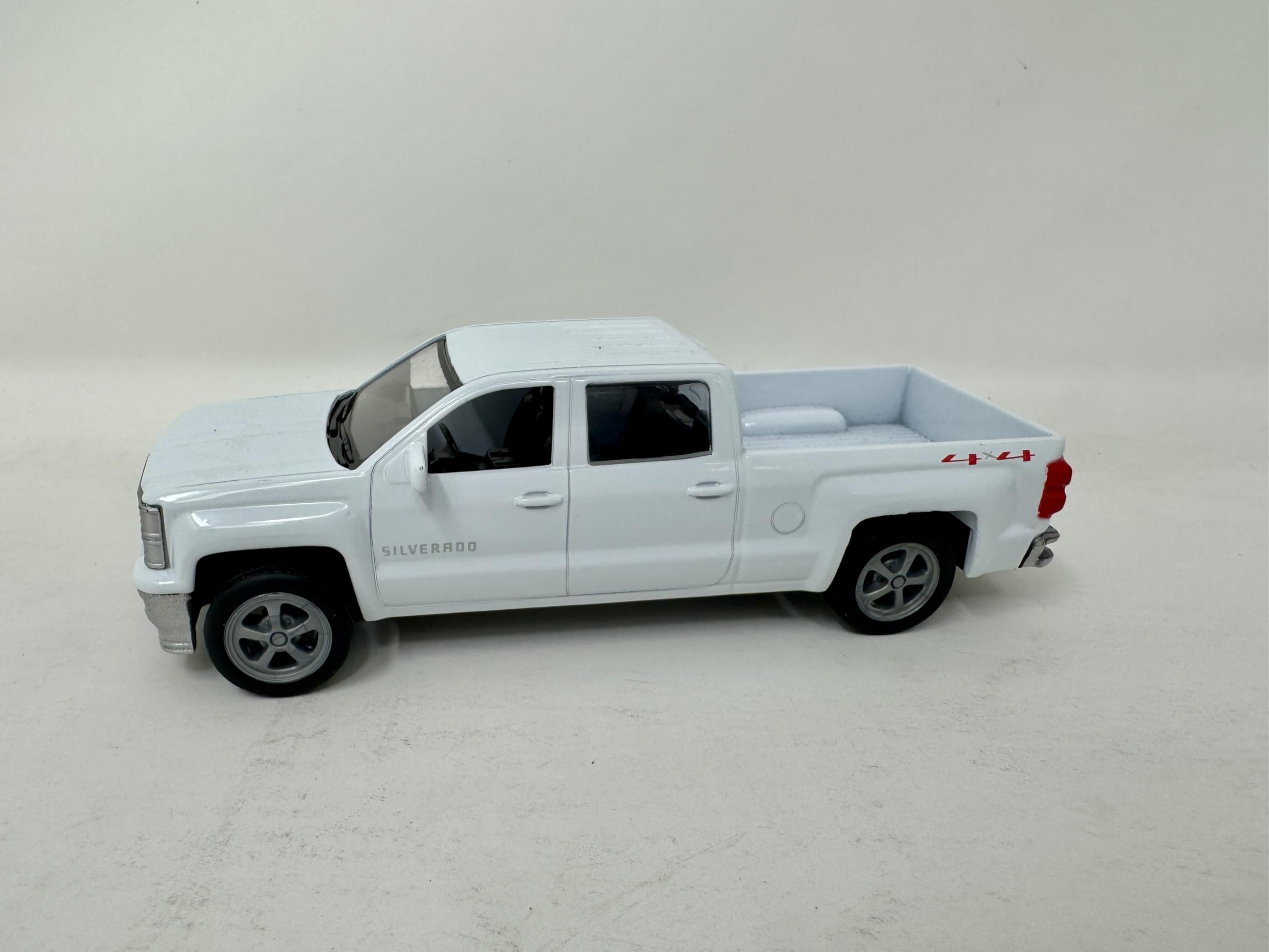 Close-up of die-cast finish and wheel detailing on the NewRay model.
