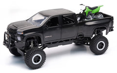 NewRay X-Treme Adventure Chevrolet 3500 HD truck with open doors for easy loading.