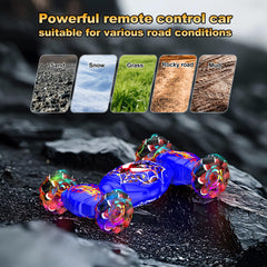 Nikuku 4WD off-road chassis powering through grass, sand, and uneven ground.