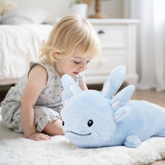 Niuniu Daddy blue axolotl plush resting beside a child during bedtime.