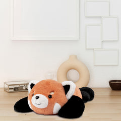 Weighted hind legs add stability for calming cuddles with Niuniu Daddy red panda.