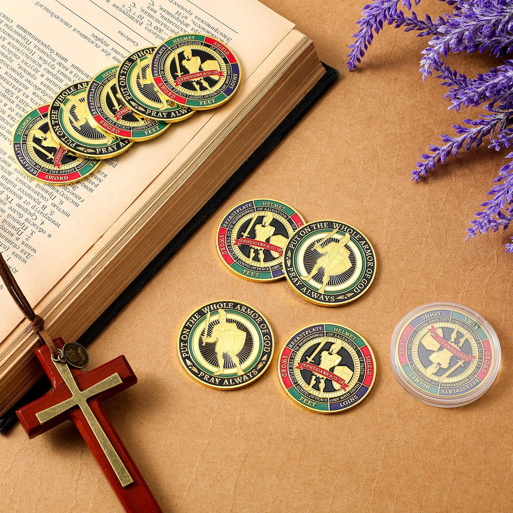 Nosiny armor of God coin in hand demonstrates portable size for pocket carry during worship or study