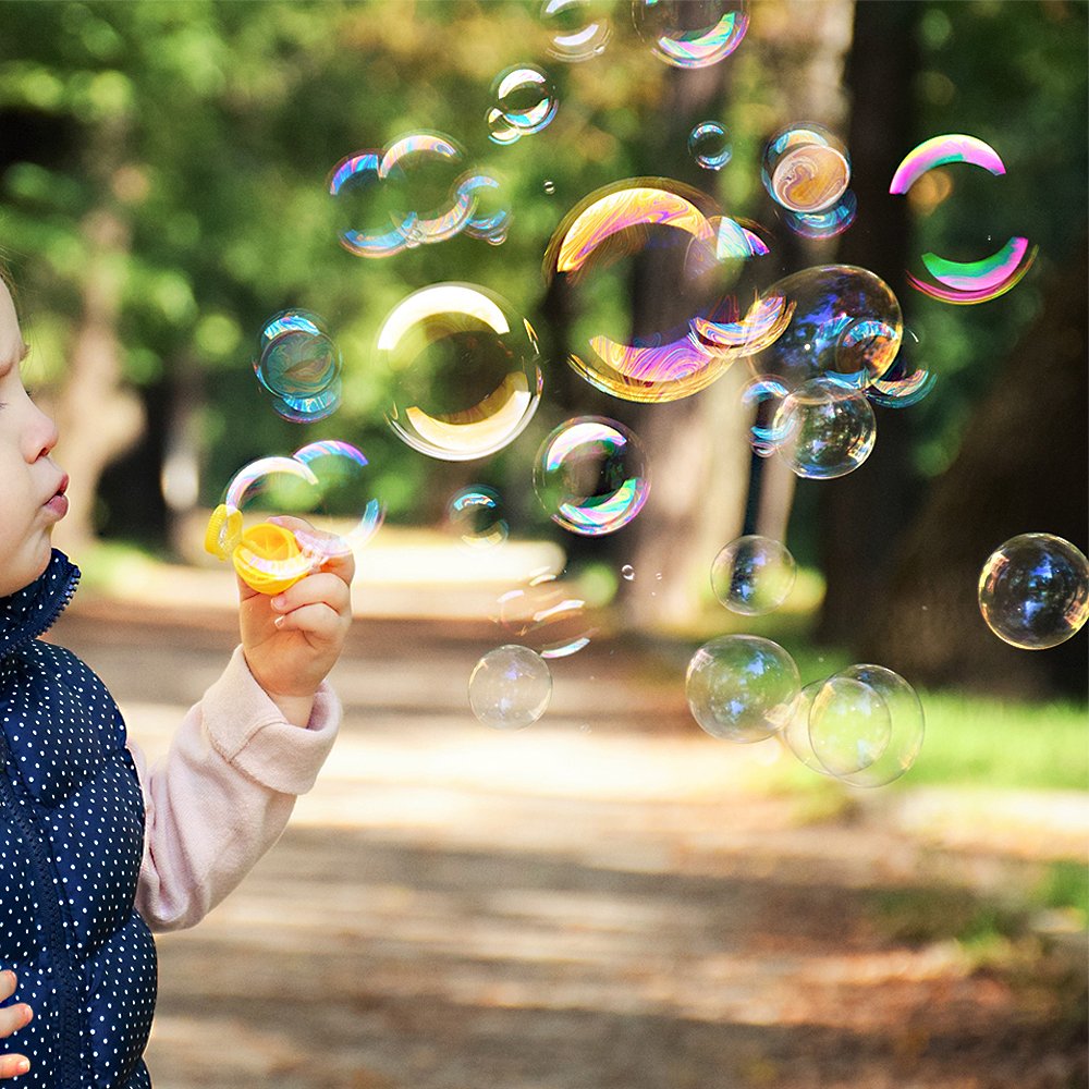 Novelinks sunlit bubbles showcase rainbow-like reflections in sunlight.