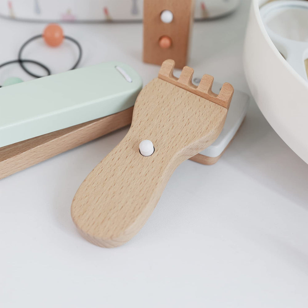 Nunukids headband and hair clipper enhance realistic role-play.