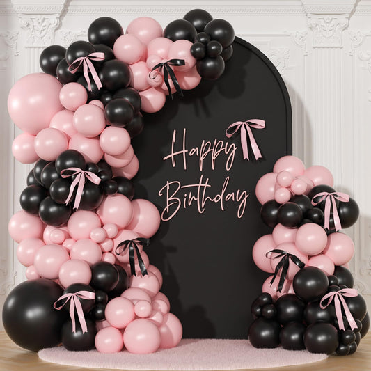 NuttyBash pink and black balloon arch kit setup creates a chic coquette backdrop.