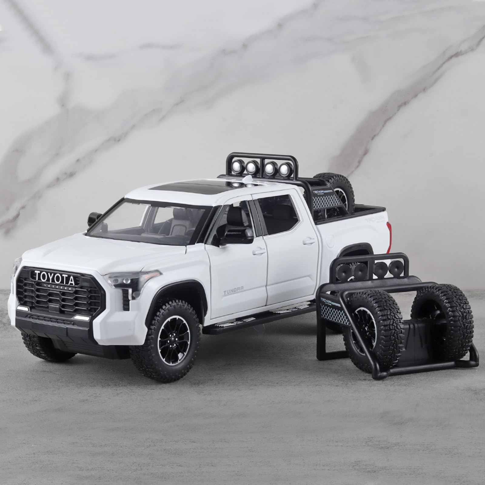OANMYJJO White Tundra rear view highlights tailgate and wheels.