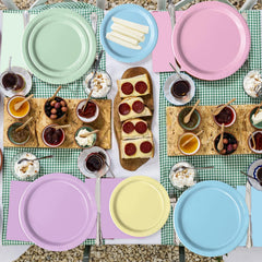 Oigco pastel-napkins complement plates and keep guests tidy during festive gatherings.