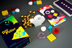 Oink Games DroPolter gameplay action with players dropping tokens to show energetic party fun benefit