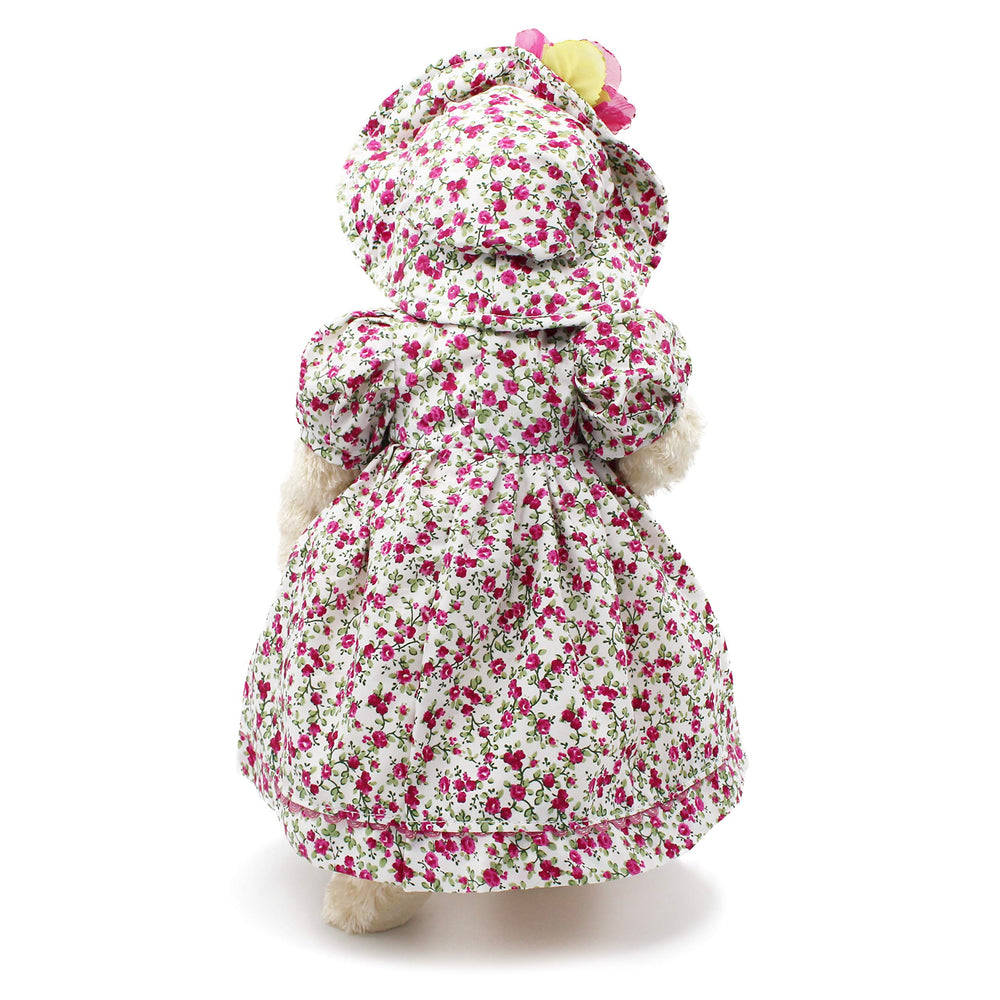 Oitscute teddy bear featuring a hand stitched nose and charm
