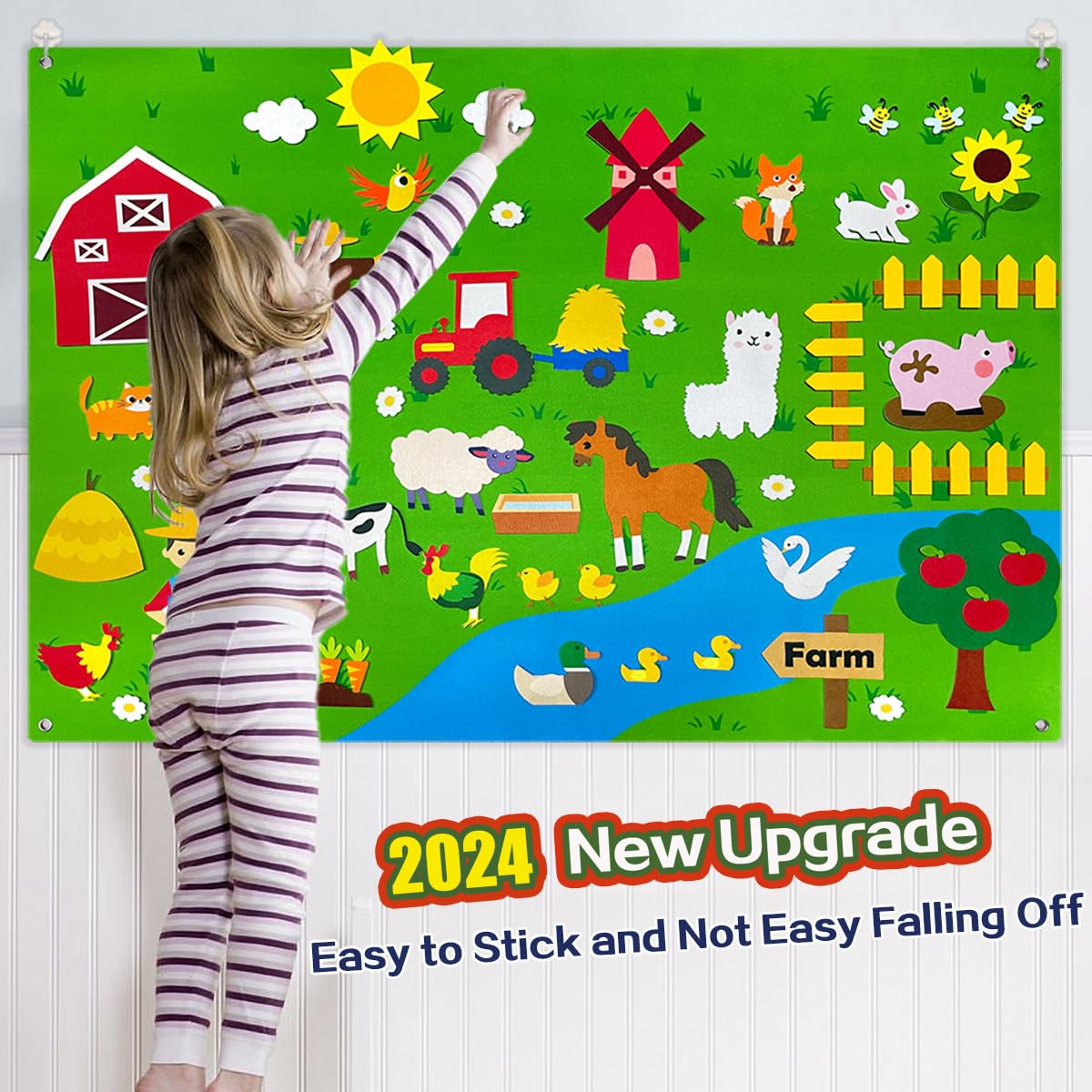 OKGIUGN children engage in creative play with the farm scene and characters.
