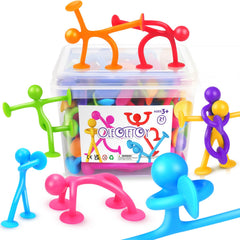 OleOletOy suction cup humanoid figure on glass demonstrates strong grip for tactile play