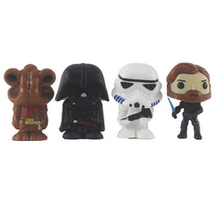 Omto Star Wars cake toppers on party table for festive ambiance