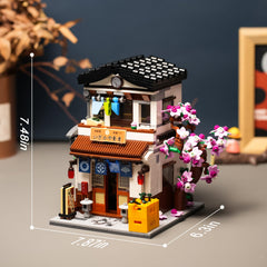 Onederbkk Cherry Blossom House features openable doors and windows for interactive building.