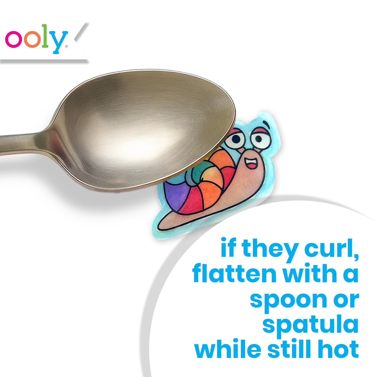 Ooly shrink charms ready to bake after coloring for fast, kid-friendly results.