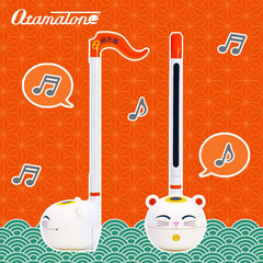 Otamatone Classic Lucky Cat side view ready for spontaneous musical play anywhere.