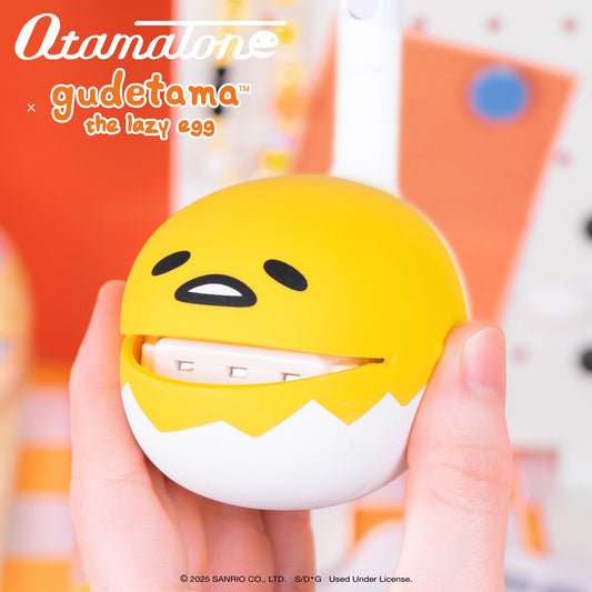 Otamatone Gudetama side view highlights slim profile ideal for small bags.