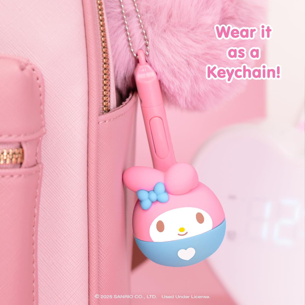 Otamatone Melody Cinnamoroll Edition shown with bright packaging and charm.