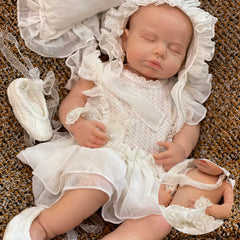 OtardDolls full-silicone reborn 18in for cuddling and dress-up play.